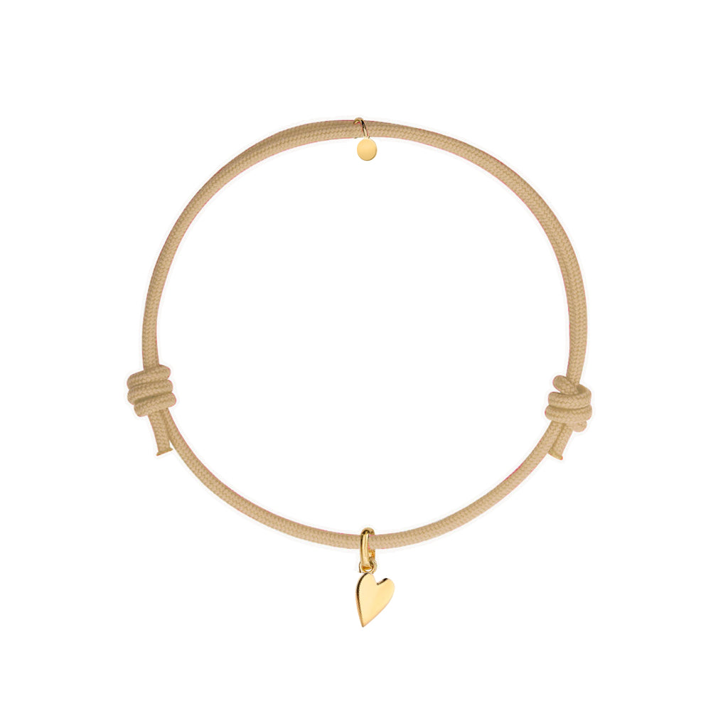 bracciale con cordino beige e ciondolo cuore oro in argento 925