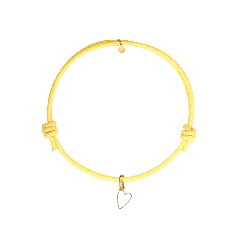 bracciale cordino giallo con ciondolo sagoma cuore oro e zirconi