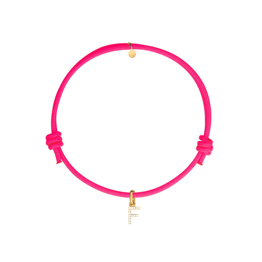 bracciale in cotone fucsia con ciondolo iniziale dorata e zirconi