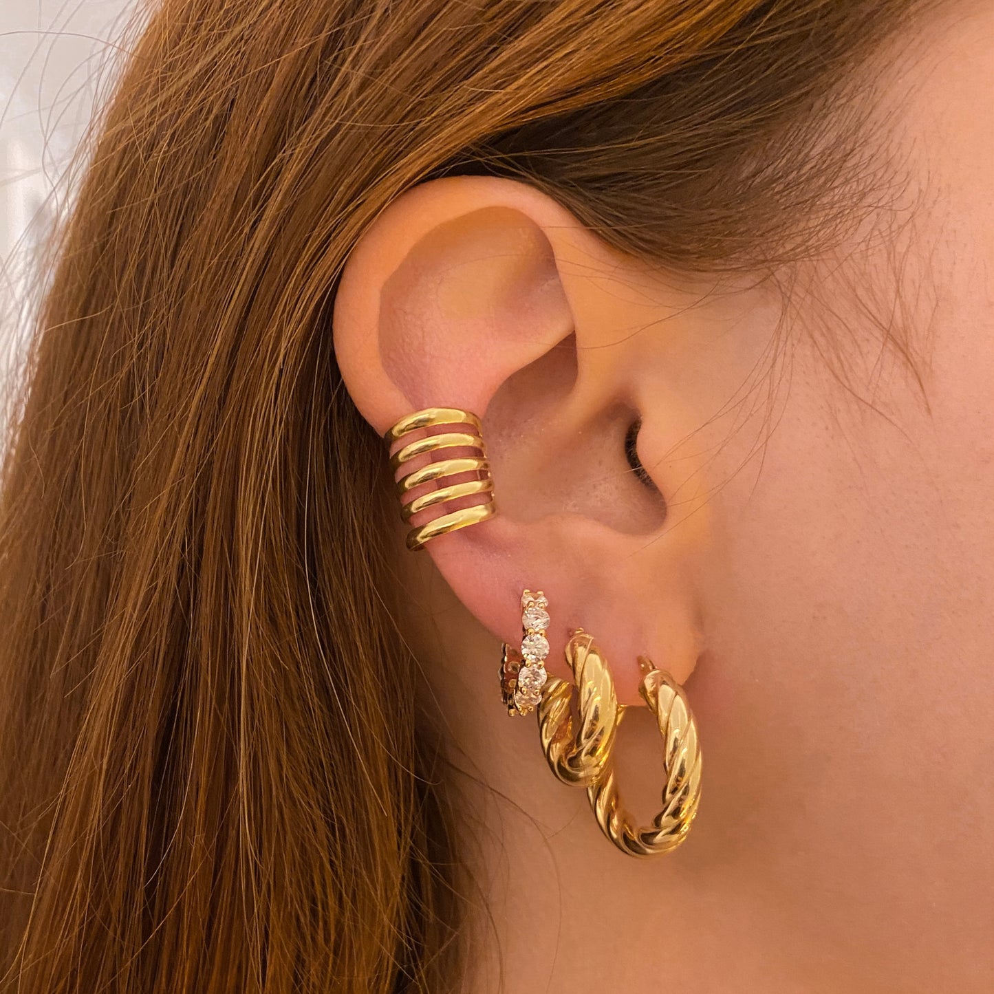 orecchini cerchio dorati e con zirconi, earcuff dorati